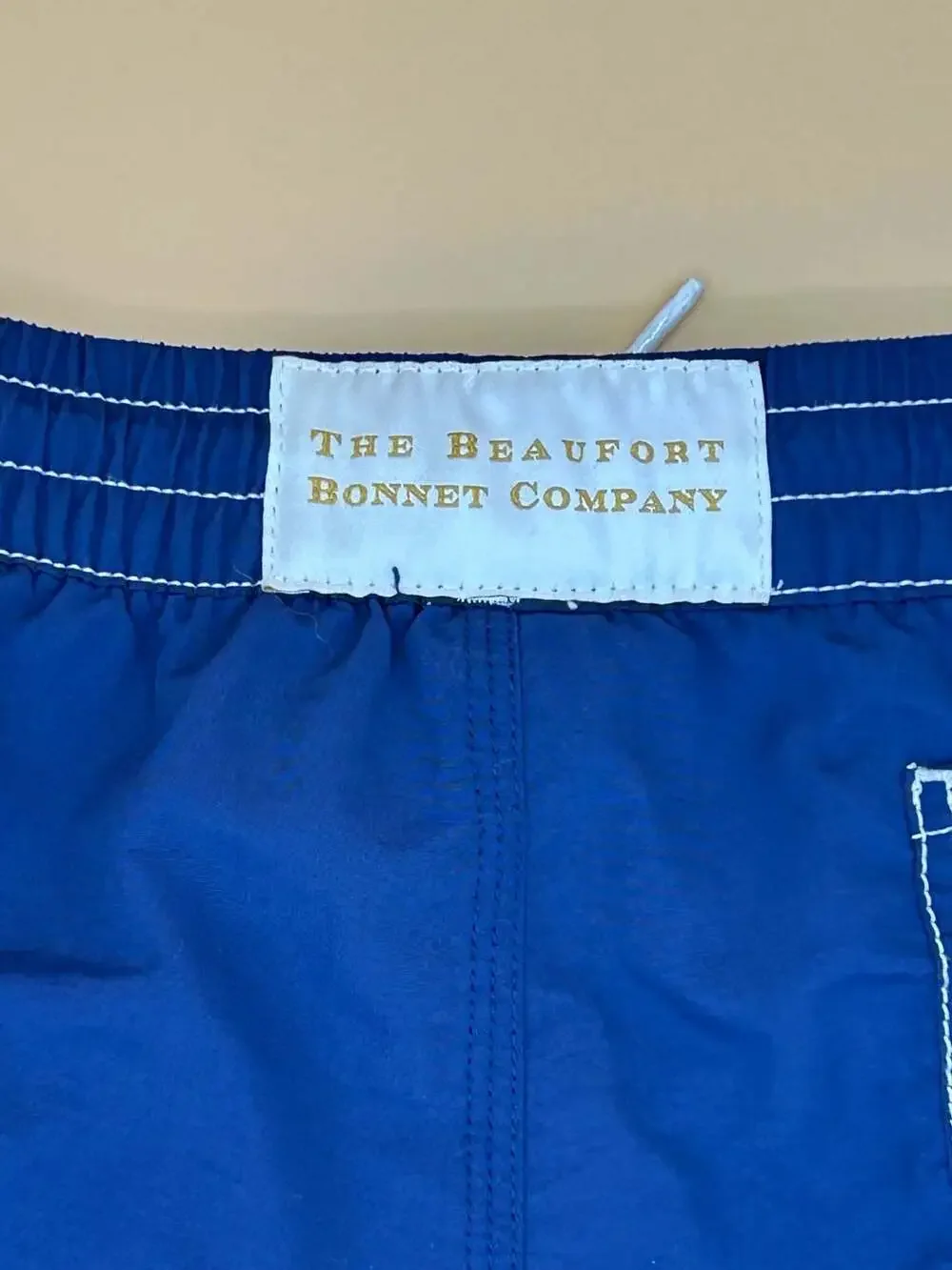 The Beaufort Bonnet Company Blue Boys Swim Trunks with Pelican Embroidery